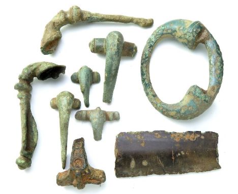Prehistoric and Roman Artefact Group. Includes a section of Bronze age rapier (51mm), an Iron age terret ring (54mm) and seve