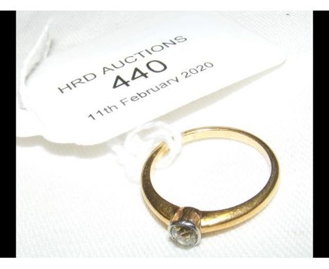 A diamond Solitaire ring in 18ct gold setting 