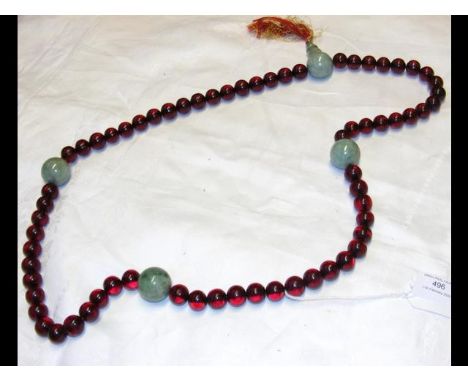 A jade and Bakelite? necklace CONDITION REPORT25mm diameter Jade ball12mm Bakelite/Amber style??