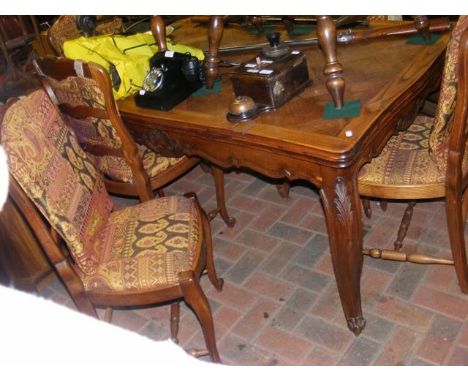 An extending French dining table on cabriole supports, with a set of six ladder back chairs CONDITION REPORTThe measurements 