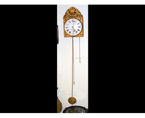 An antique French comptoise clock, with floral painted enamel dial  