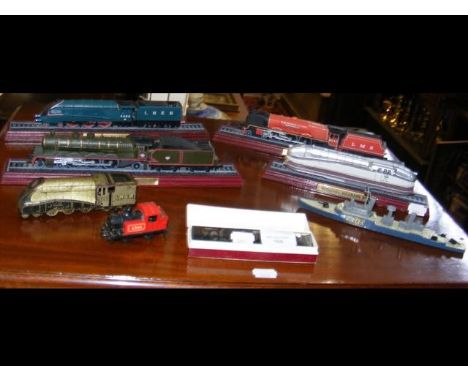 Old tinplate LNER model, together with model trains and harmonica 