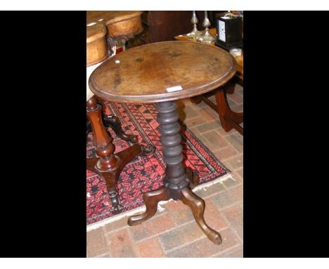 A 19th century wine table on bobbin support 