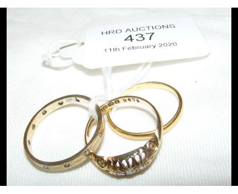 A 22ct gold ring, 18ct gold diamond ring and one other 