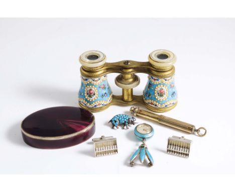 A PAIR OF OPERA GLASSES, gilt brass and floral &amp; blue enamel, c.1900; 9.5 cms, a purple enamel &amp; silver gilt snuff bo