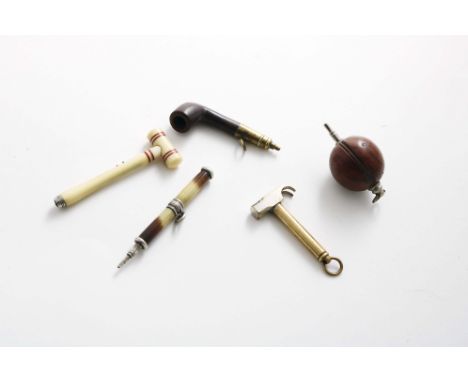 FIVE VARIOUS SMALL LATE VICTORIAN NOVELTY PENCILS:- A plated claw hammer, a brass-mounted pipe, a nickel-mounted ivory mallet