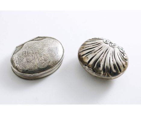A GEORGE I SNUFF BOX cartouche-shaped with a slightly domed and engraved cover, reeded borders and a gilt interior, unmarked 