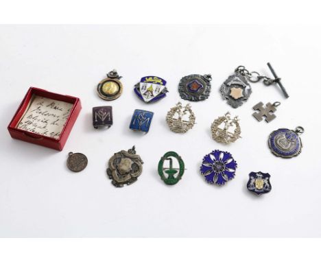 THIRTEEN VARIOUS BADGES/FOBS (six decorated with enamel), a small unmarked cross and a small copper medallion commemorating t