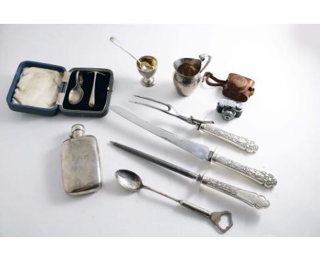 A MIXED LOT:- A child's pusher &amp; spoon (cased), a small cream jug, an Edwardian engraved egg cup and spoon, a spirit flas