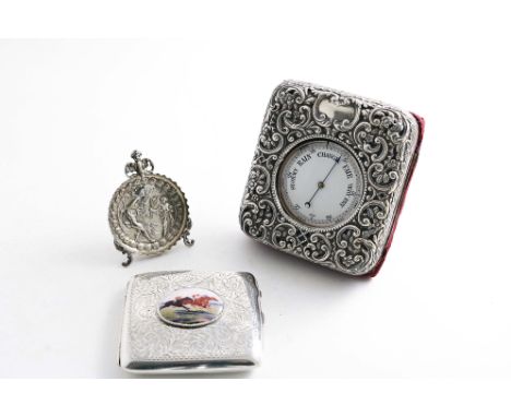 AN EDWARDIAN MOUNTED WOODEN CASE with an easel stand fitted with a nickel-plated, pocket barometer, the mounts by H. Matthews