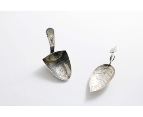 A GEORGE III LEAF CADDY SPOON with pricked veins and a coiled tendril &amp; leaf handle, initialled, by Thomas Wilmore, Birmi