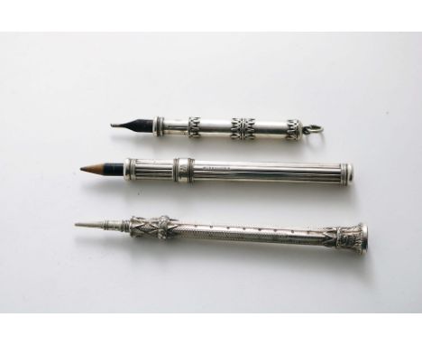 A LATE VICTORIAN PENCIL in the form of a reeded column with bloodstone seal terminal and engine-turning, by S. Mordan &amp; C