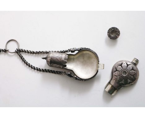 A LATE 17TH CENTURY VINAIGRETTE/POMMANDER in the shape of an engraved flask with suspensory chains, and a small circular foot