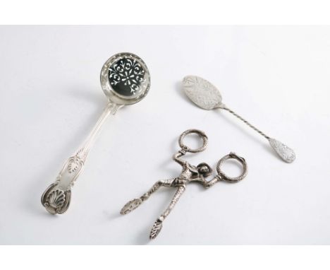 A PAIR OF CONTINENTAL CAST HARLEQUIN SUGAR NIPS with English import marks for London 1885, a King's pattern sugar sifter ladl