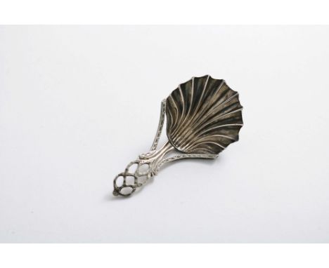 A GEORGE III CADDY SPOON with a fluted shell bowl and a bright-cut openwork stem, by John Langlands (I) and John Robertson (I