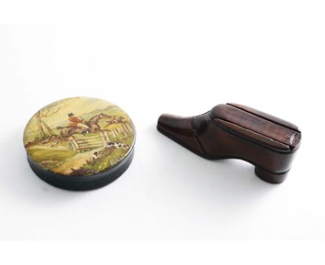 A 19TH CENTURY CARVED WOODEN SHOE SNUFF BOX with a slide cover and inlaid brass pique-work on the sole and the front, togethe