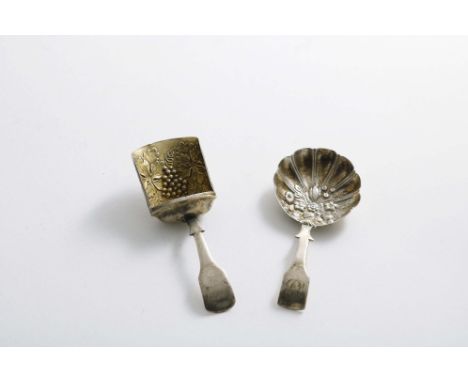 LEA &amp; CO:- A George III Fiddle pattern caddy scoop with a gilt bowl, stamped with fruiting vines and another Fiddle caddy