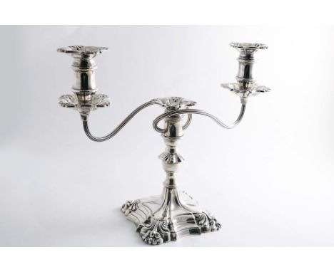 A LATE 20TH CENTURY THREE-LIGHT CANDELABRUM on a shaped square base with shell decoration, a short column, reeded scroll bran