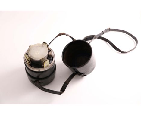 A VICTORIAN CAMPAIGN SET IN A FITTED LEATHER CASE, INCLUDING:- a nest of five beakers, two small pedestal goblets (one fittin