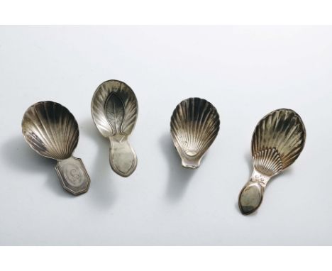 A GEORGE III CADDY SPOON with a fluted oval bowl and a canted rectangular handle, initialled "S", by Thomas Lamborn, Sheffiel