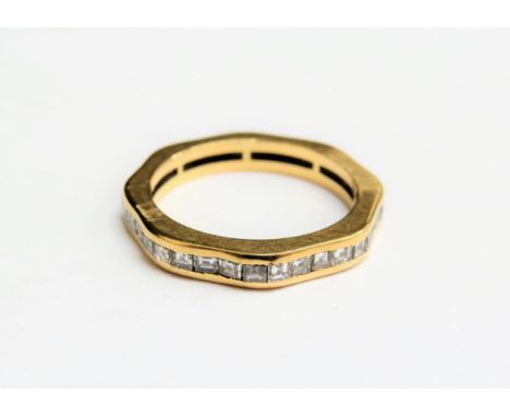 A gold square cut diamond eternity ring, unmarked. Size K, 3.5g 