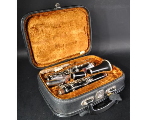 An original Corton made clarinet musical instrument made in Czechoslovakia. The clarinet appears in good condition within fit