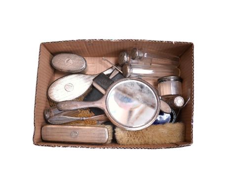 Fourteen silver mounted toilet jars, brushes, mirror, comb etc, together with a pair of glass handled silver salad servers an