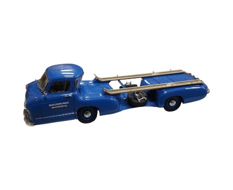 A boxed CMC 1:18 scale diecast model of a Mercedes-Benz 1954 racing car transporter. Condition - good.