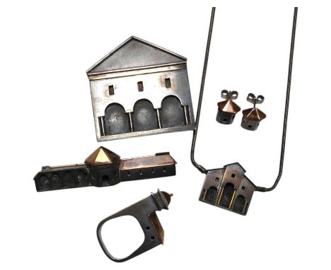 An unusual 1970's parcel gilt silver suite of jewellery, by Vicki Ambery-Smith, of architectural form, comprising a ring, ear