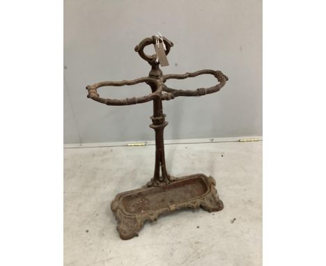 A Victorian cast iron stick stand, height 70cm. Condition - poor as paint loss and oxidised