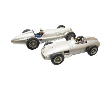 Two boxed CMC 1:18 scale diecast model cars; a Mercedes-Benz W196, together with a Mercedes-Benz W154 1938. Condition - fair 
