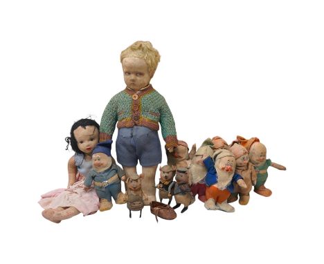 A Merrythought Hygienic Toys Snow White and the seven dwarves, three Schuco clockwork pig musicians and a felt doll. Conditio