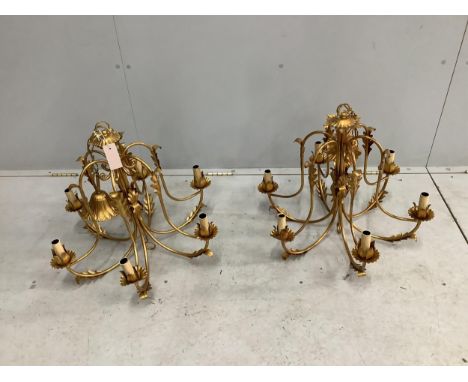 A pair of modern gold painted metal light fittings, diameter 60cm, height overall 80cm. Condition - good