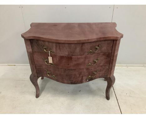 A Continental serpentine three drawer commode with simulated marble covering, width 91cm, height 81cm. Condition - fair condi