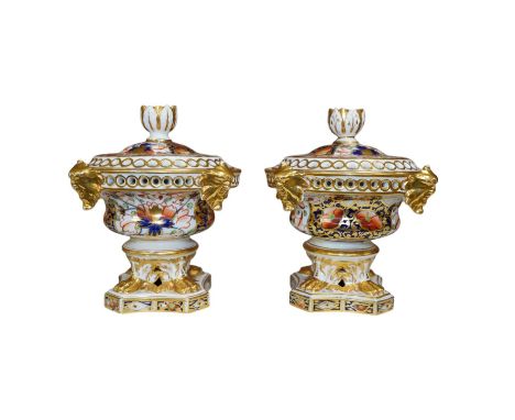 A pair of  Derby Imari pattern pot pourri pots and covers, 14cm high. Condition - gilding worn in places and one pot has two 