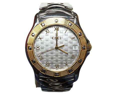 A gentleman's modern steel and gold plated Ebel Wave quartz wrist watch, with basket weave dial, on a stainless steel Ebel br