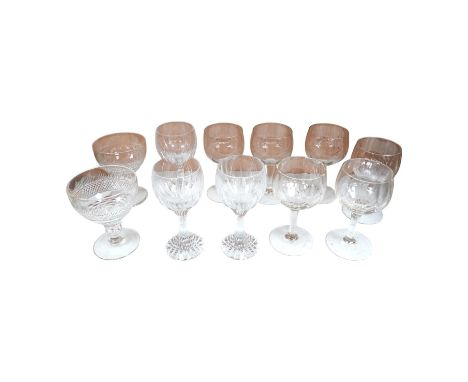 Three Baccarat (stamped) crystal ‘Massena’ cut glass wine goblets, a pair of late 19th century cut glass rummers and a set of