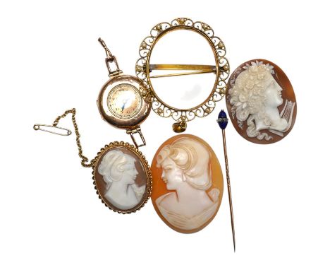 Three carved oval cameo shells, including tow in 9ct pendant or brooch mount, a 9ct gold wrist watch (a.f.) and a stick pin. 