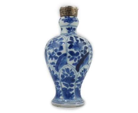 A Chinese small blue and white, white metal mounted vase, Kangxi, 12cm. Condition - poor to fair