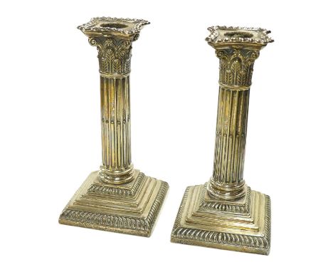 A pair of late Victorian silver Corinthian column dwarf candlesticks, Hawksworth, Eyre & Co, Sheffield, 1899, height 17.4cm, 