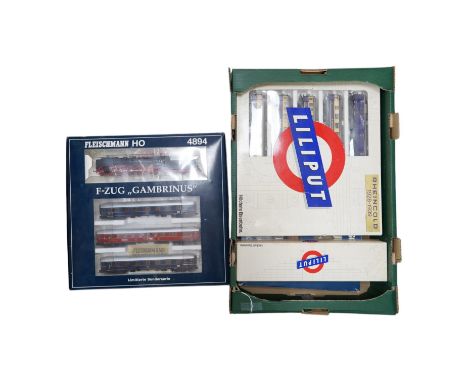 Two boxed Fleischmann HO gauge German passenger train sets, both comprising of a tender locomotive and bogie coaches (4885 an