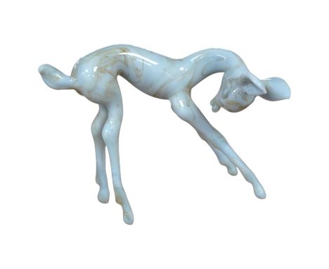 A group of collectables comprising an Istvan Komaromy blue glass foal, 11cm high, three 19th century French faience cows, a S