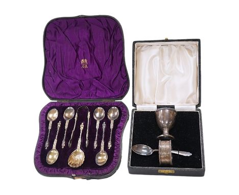 A cased set of six Victorian silver apostle teaspoons, tongs and caddy spoon, 1882, 3.7oz, and a cased George VI silver chris