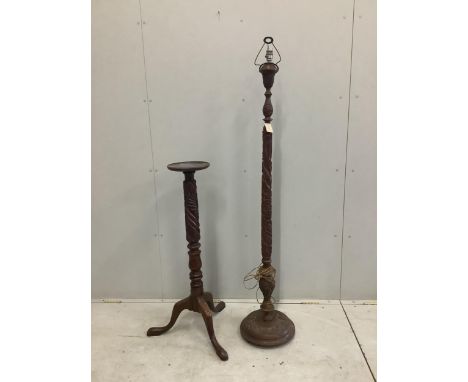 A 19th century Asian hardwood lamp standard carved with dragons, height 150cm, together with a carved mahogany torchere, heig