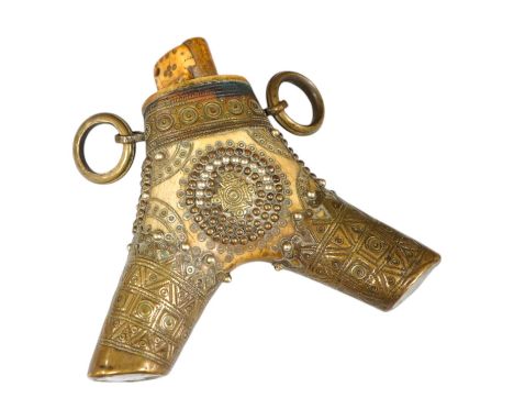 A Transylvanian brass mounted bone powder flask, 17cm high. Condition - fair to good