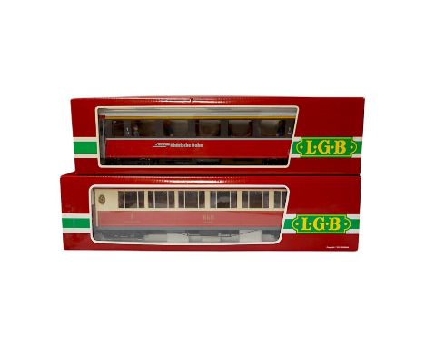 Three boxed LGB G scale Continental outline RhB bogie coaches;  a Full First (30650), a restaurant car (3068), and another Fu