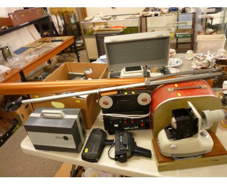 Fine ensemble of vintage projector and film equipment including cameras, projectors, screen etc