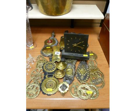 Quantity of horse brasses, slate mantel clock and Swarovski type ornaments