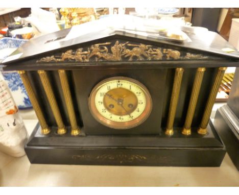 Excellent triple pillared steeple topped slate mantel clock with brass dial, pendulum and key present