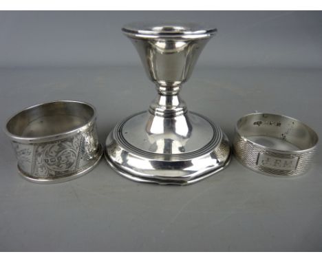 Chester silver squat candlestick and two hallmarked silver napkin rings